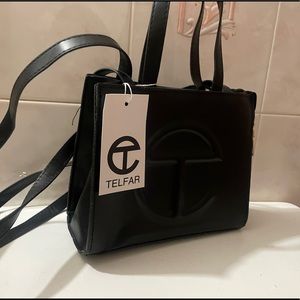 Black female telfar samll bag